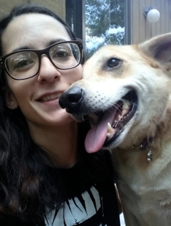 Elena Dunkle with a very happy dog